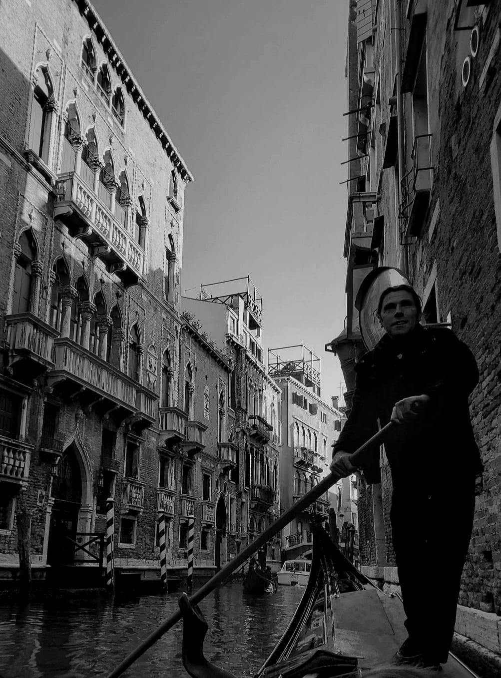 Venice, Italy — A gondola through the back canals
